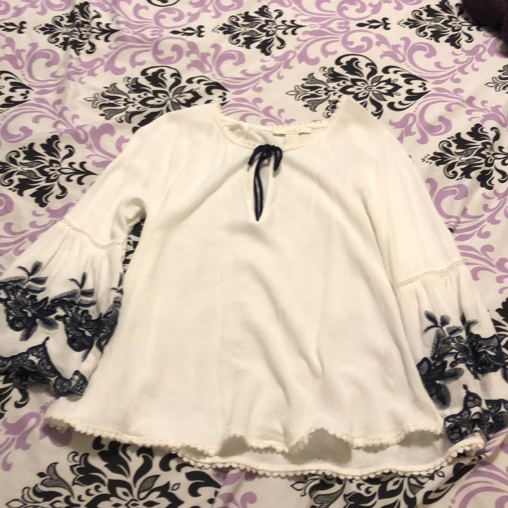 Long sleeve white top with bell sleeves